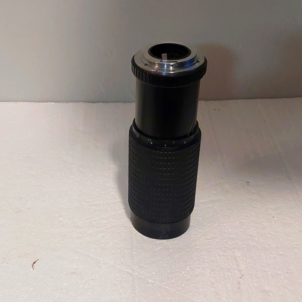 TELESOR Zoom Lens MC 1:5.6 f= 75-300mm with lens cap and UV filter